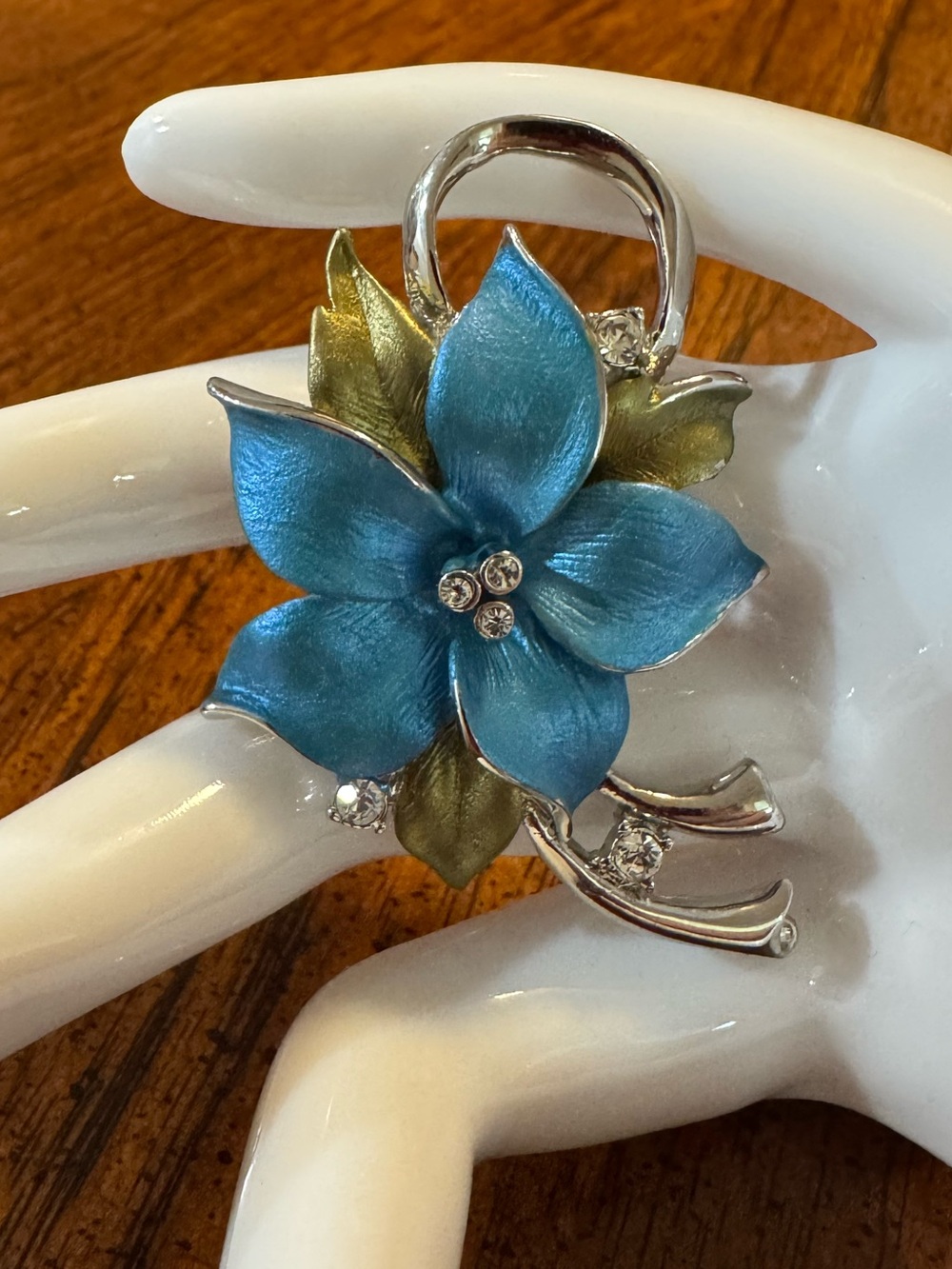 Blue and green enamel flower brooch with clear rhinestones on silver tone, EUC.